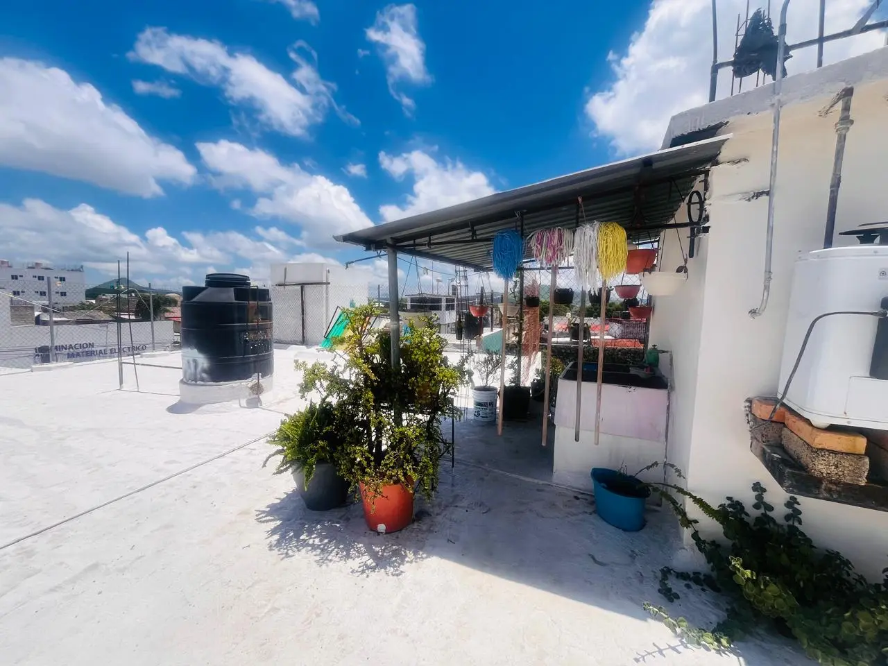 Terraza con área de tendido y descanso